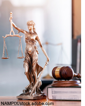 Legal and law concept. Statue of Lady Justice with scales of justice and wooden judge gavel on wooden table. Panoramic image statue of lady justice.